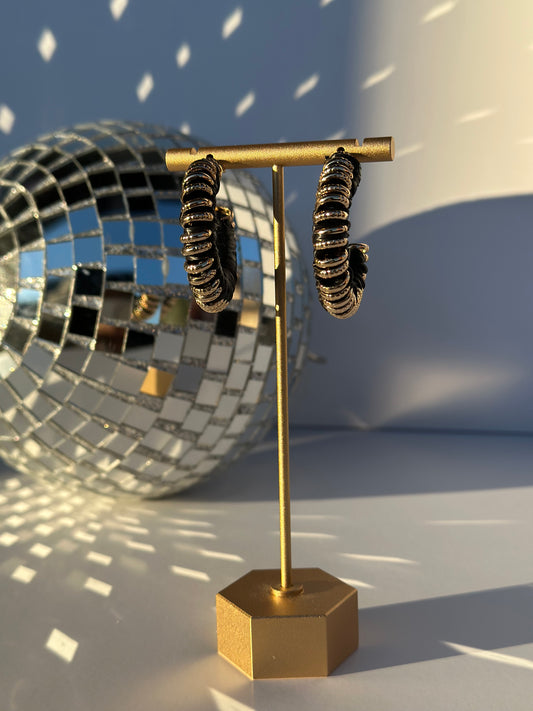 Black wrapped metal hoops